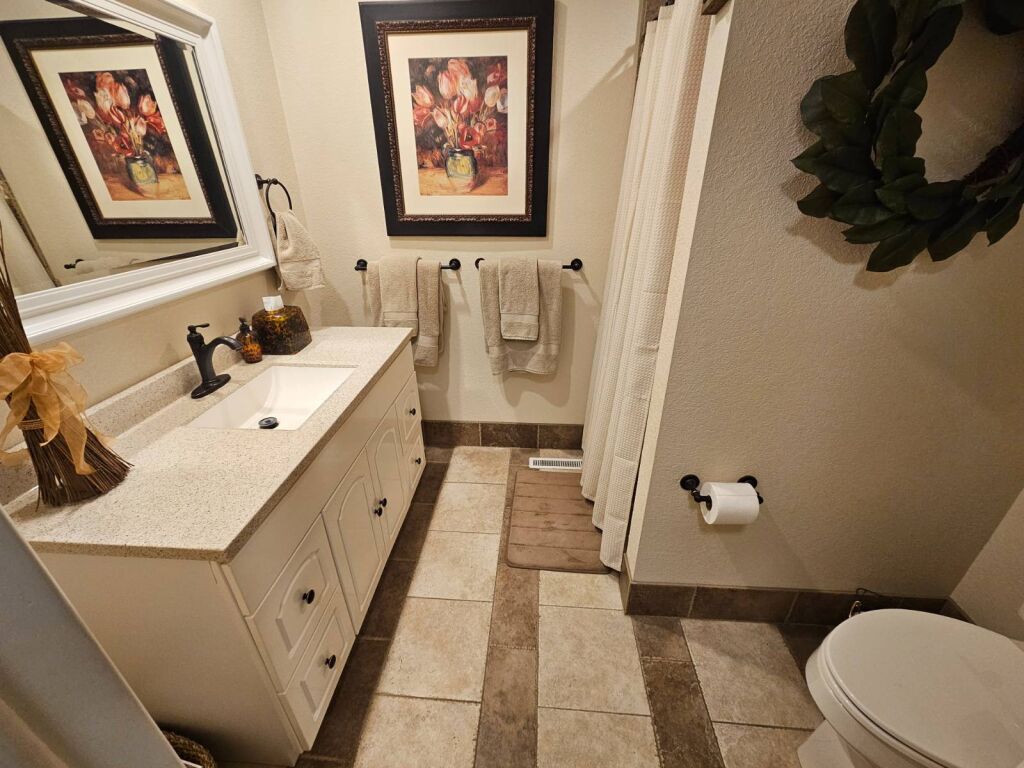 824 Marvin St. in Kiowa, Kansas — Bathroom