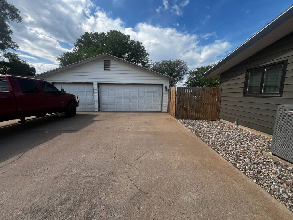 501 N. Cedar in Medicine Lodge, Kansas — Driveway and garage