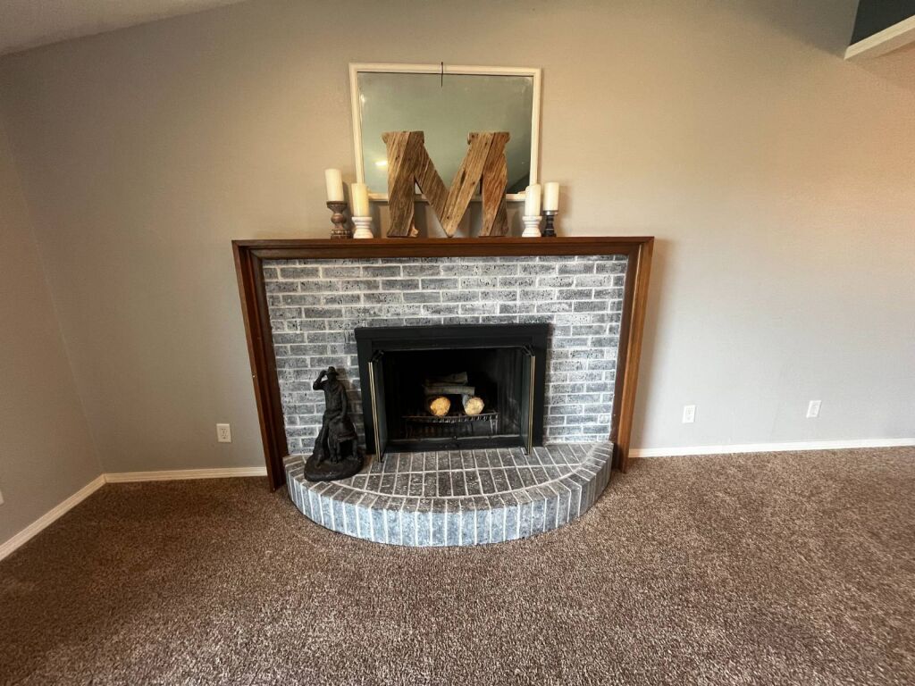 501 N. Cedar in Medicine Lodge, Kansas — Living room fireplace