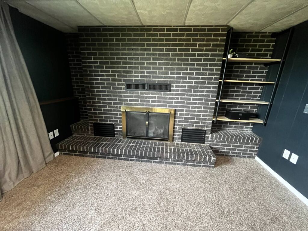 501 N. Cedar in Medicine Lodge, Kansas — Lower level fireplace