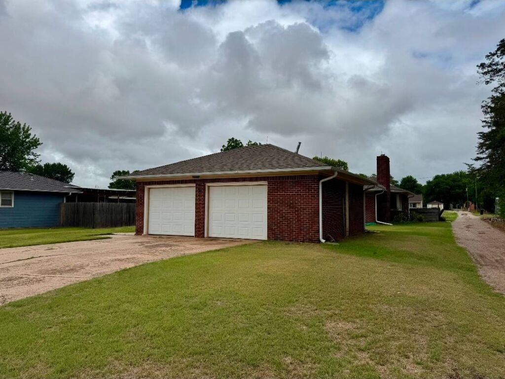 610 Holmes St. in Kiowa, Kansas — Exterior