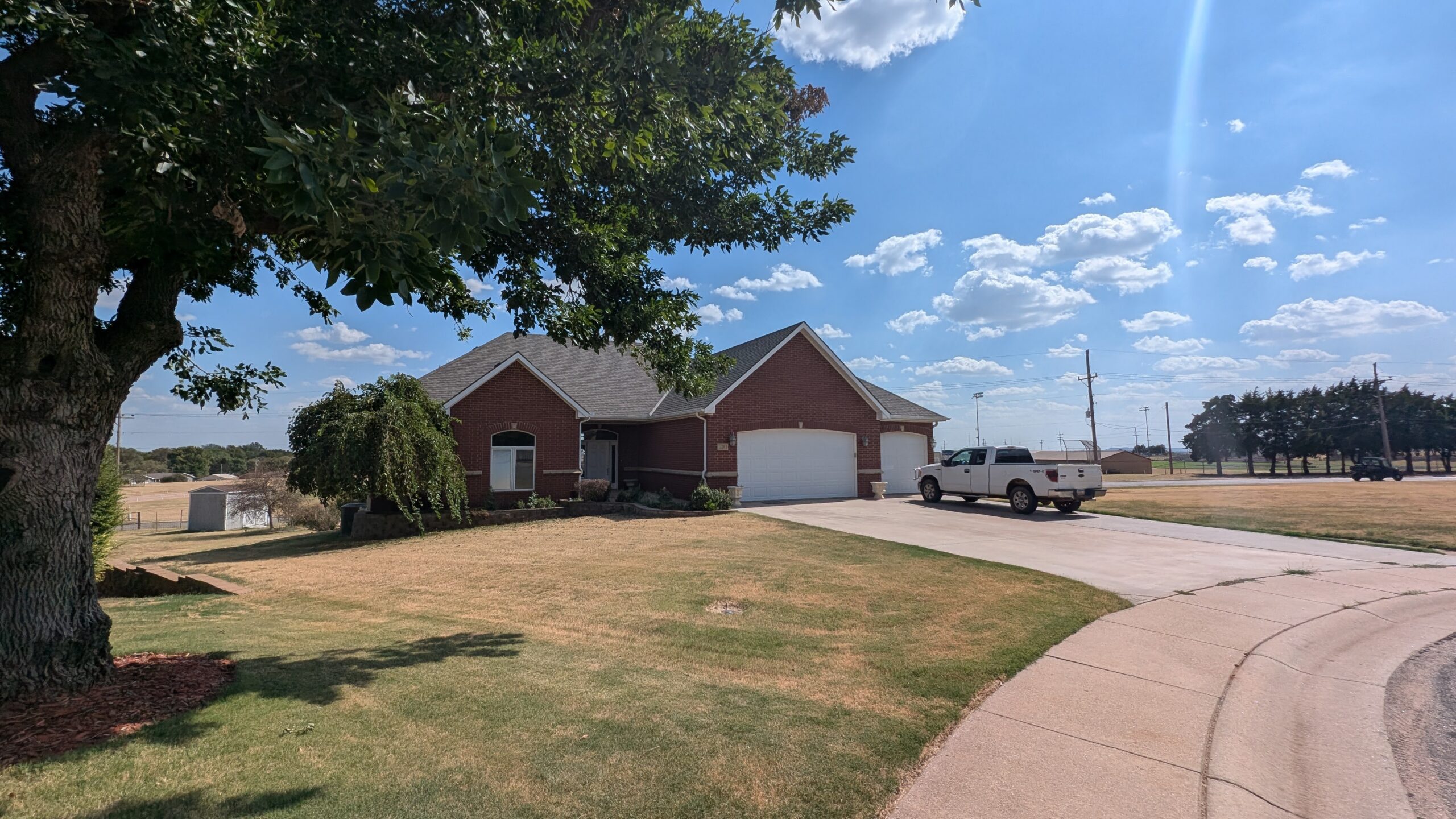 120 Lisa Circle in Medicine Lodge, Kansas — Driveway and front of the house