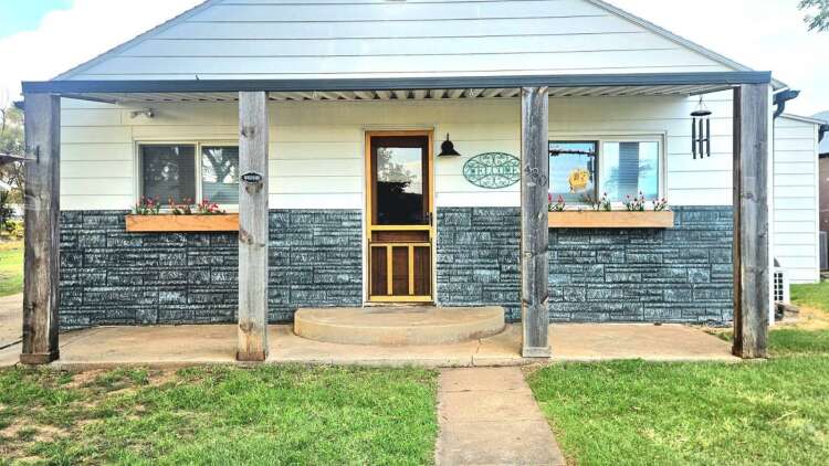 430 Campbell St. in Kiowa, Kansas — front elevation