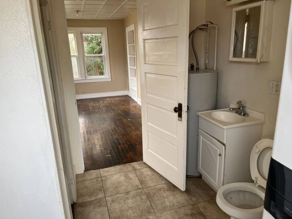 306 N. Main St. in Medicine Lodge, Kansas — Unit 1 Bathroom