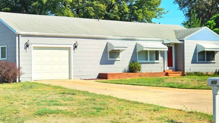 312 S. 9th St. in Kiowa, Kansas — front elevation